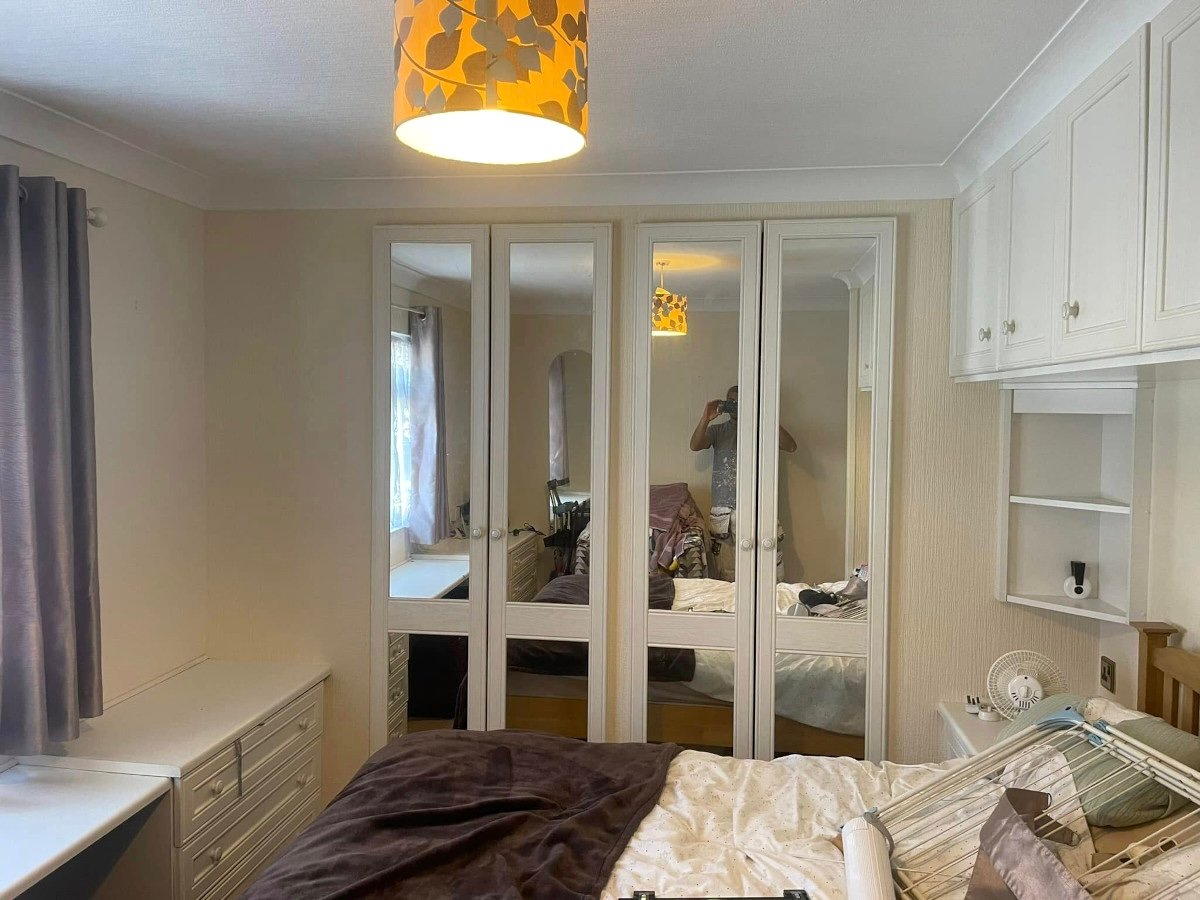 bedroom-cream-painted-walls-mirrored-wardrobes-newport-orchid-decor Bedroom with cream painted walls and mirrored wardrobes, interior decorating in Risca by Orchid Decor