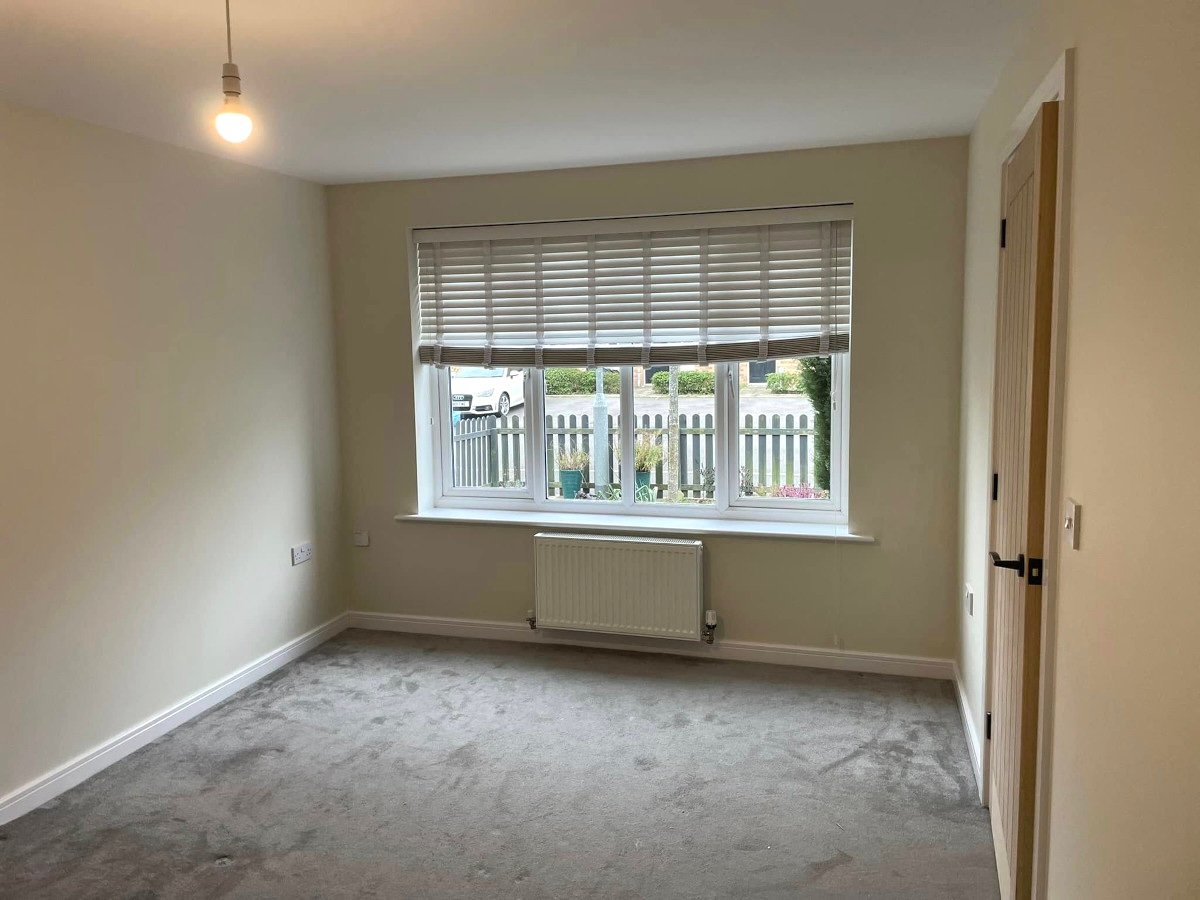 Bedroom with cream painted walls and venetian blinds, interior decorating in Caerphilly by Orchid Decor