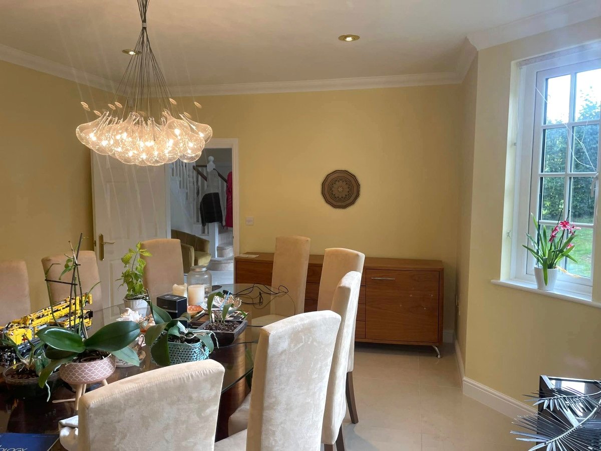 dining-room-cream-painted-walls-statement-chandelier-newport-orchid-decor Dining room with cream painted walls and statement chandelier, painted by Orchid Decor Newport