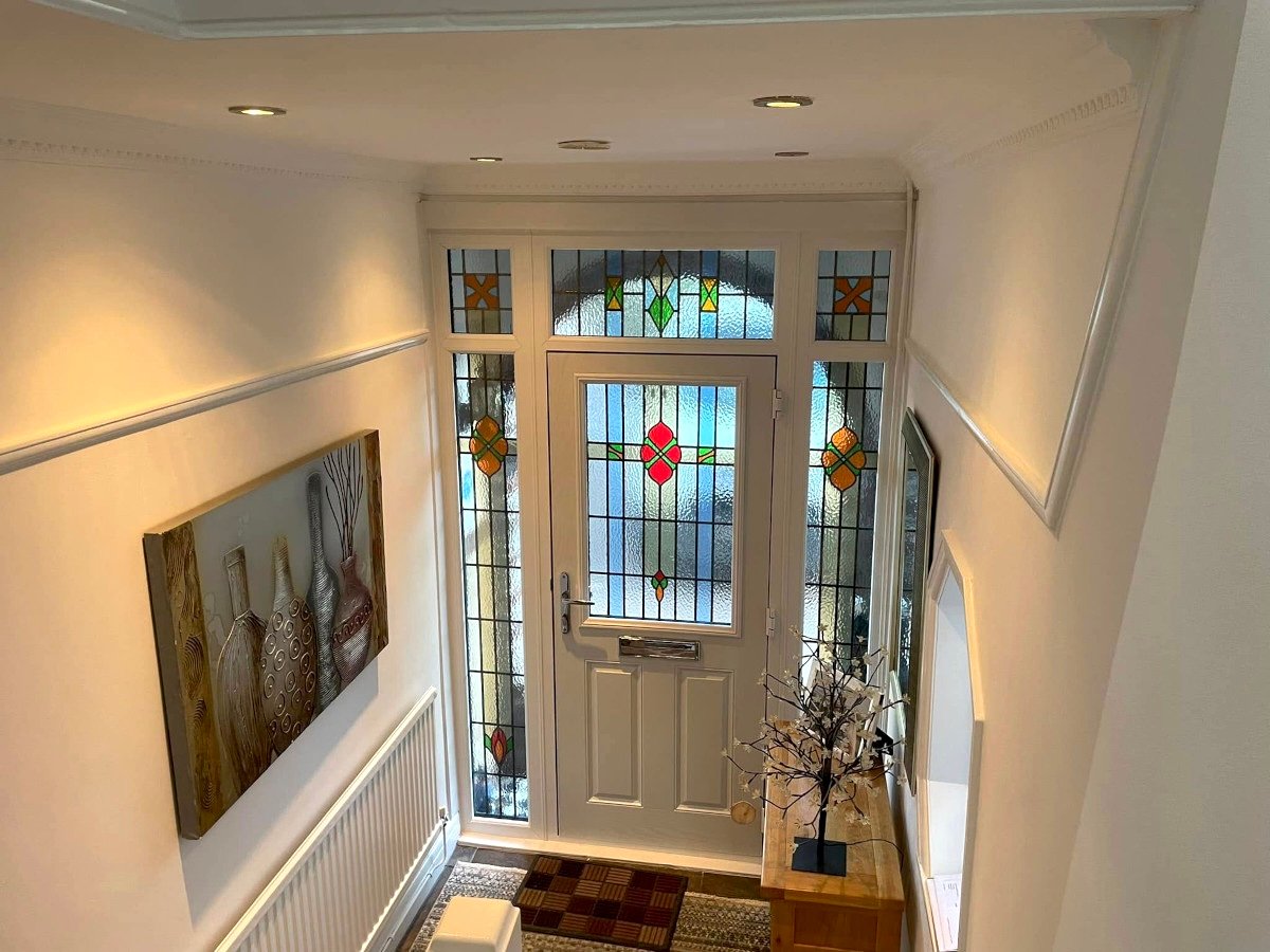 Period property painting in Newport by Orchid Decor, cream painted entryway with stained glass door
