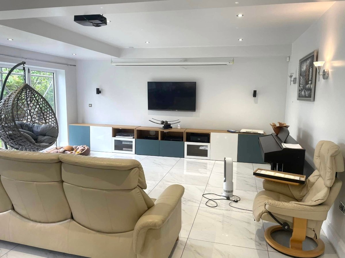 living room white painted walls tiled floor tv newport orchid decor