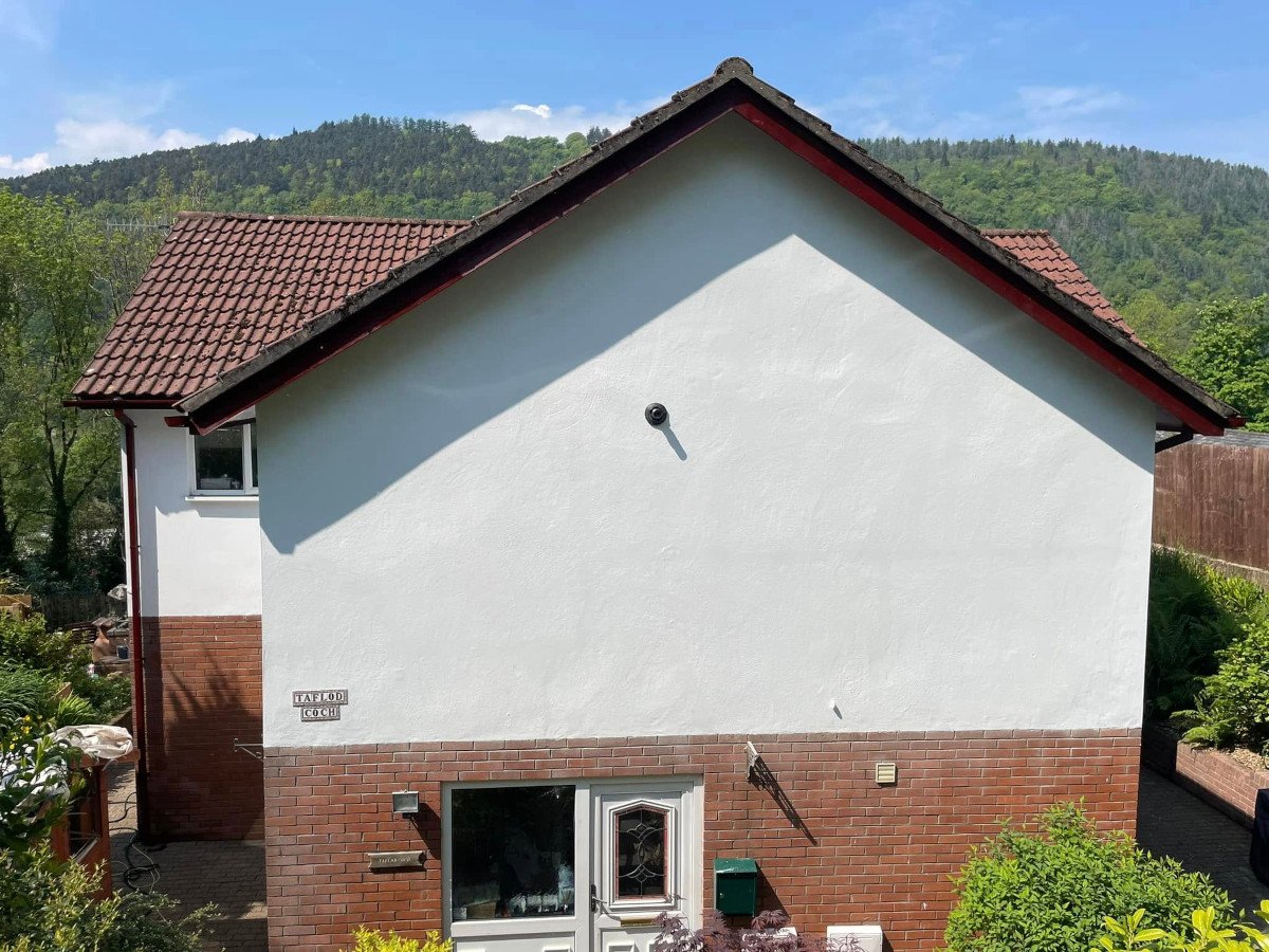 newport-detached-home-exterior-painted-white-orchid-decor newport detached home exterior painted white orchid decor