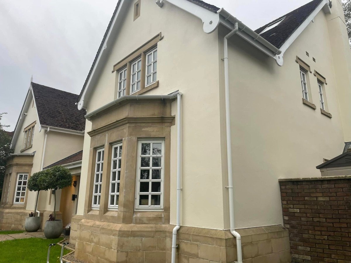 newport-home-exterior-walls-painted-orchid-decor newport home exterior walls painted orchid decor